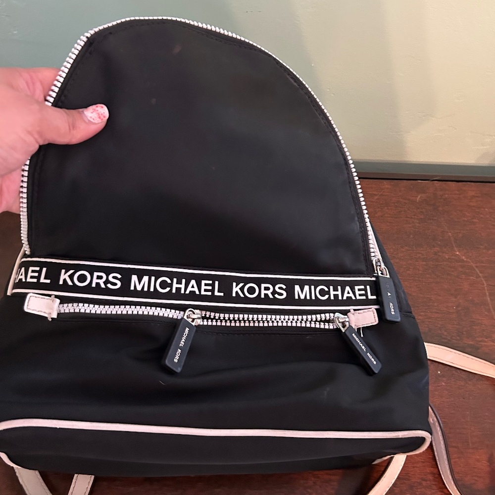 Black and white nylon backpack